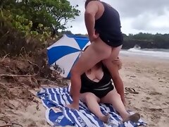 Blowjob on the beach with a